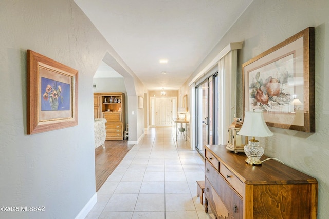 5800 N Placita Esplendora, Tucson, AZ 85718 - corridor with light tile patterned floors and baseboards