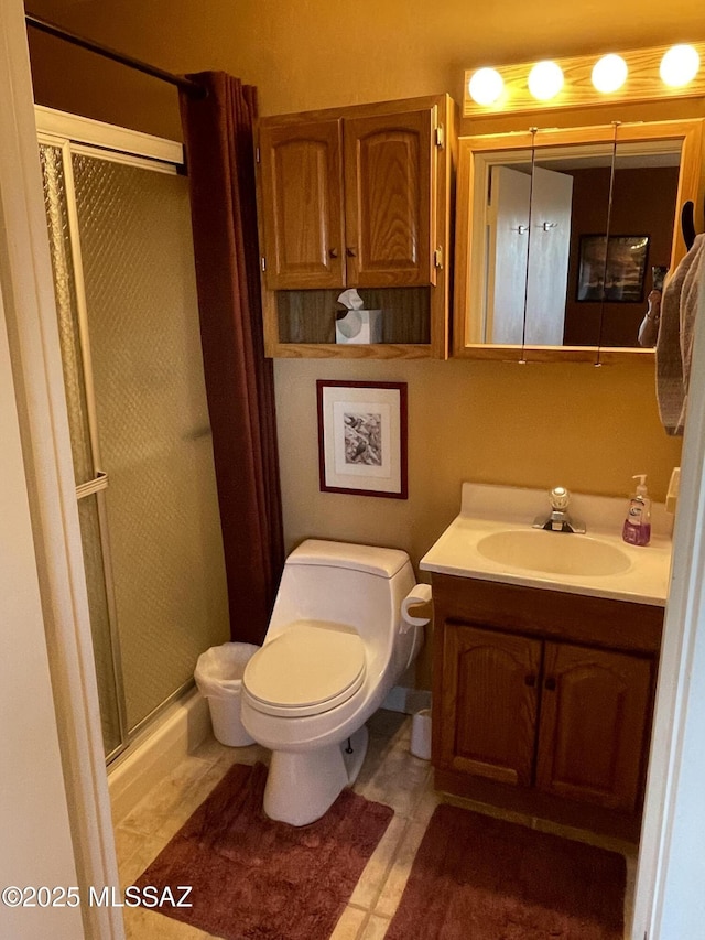 360 W Camino Del Sonador, Green Valley, AZ 85614 - bathroom featuring a stall shower, toilet, and vanity