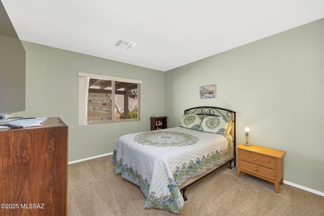 62284 E Iron Crest Dr, Saddlebrooke, AZ 85739 - bedroom featuring carpet floors and baseboards