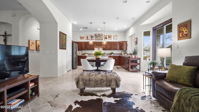15083 S Placita Rancho Verano, Sahuarita, AZ 85629 - living area featuring recessed lighting, arched walkways, and light tile patterned floors