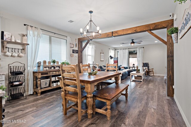 14233 E Hub Dr, Vail, AZ 85641 - dining area with dark wood-style flooring, healthy amount of natural light, and a ceiling fan