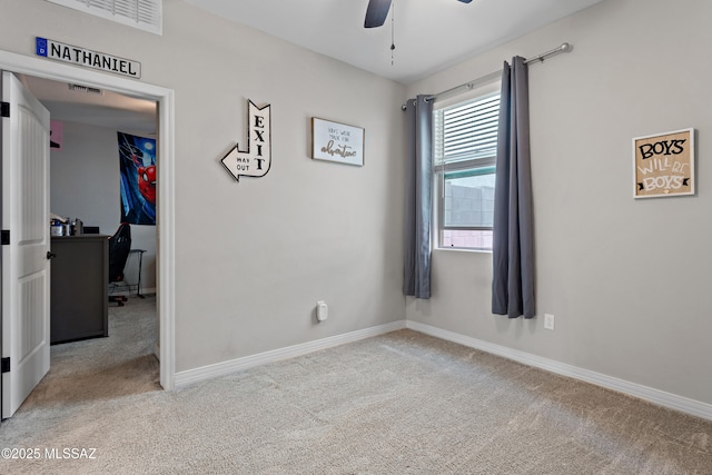 14233 E Hub Dr, Vail, AZ 85641 - carpeted spare room featuring ceiling fan and baseboards
