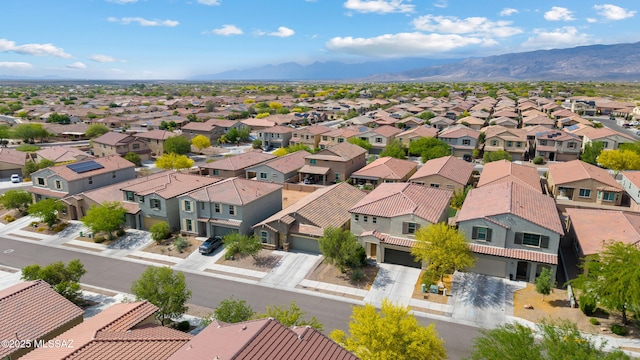 14233 E Hub Dr, Vail, AZ 85641 - aerial perspective of suburban area featuring a mountainous background
