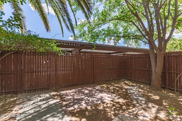view of patio with a fenced backyard