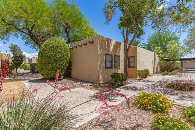 view of property exterior featuring stucco siding