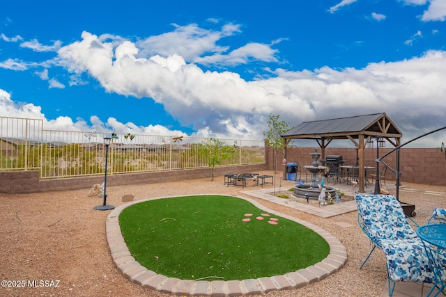 7988 S Bonanza Park Dr, Tucson, AZ 85747 - view of yard featuring a gazebo, a patio, and fence
