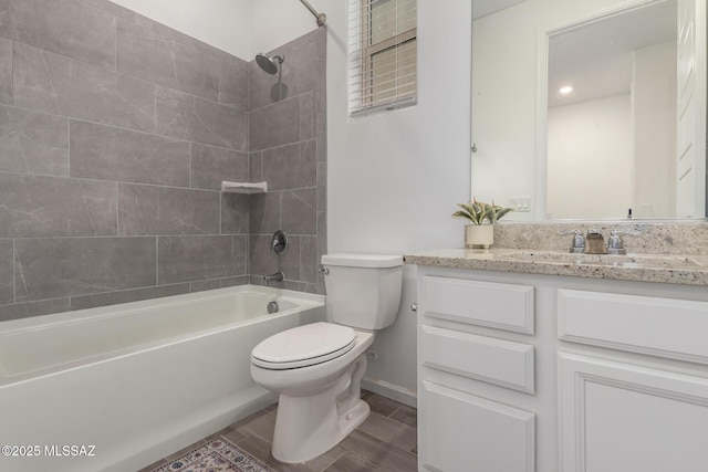 7988 S Bonanza Park Dr, Tucson, AZ 85747 - full bathroom featuring toilet, shower / bath combination, vanity, and baseboards