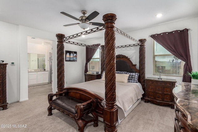 7988 S Bonanza Park Dr, Tucson, AZ 85747 - bedroom featuring light colored carpet, recessed lighting, ensuite bath, and a ceiling fan