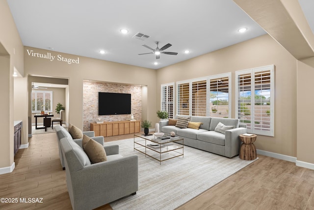 60922 E Arbor Basin Rd, Oracle, AZ 85623 - living room featuring ceiling fan, light wood finished floors, baseboards, and recessed lighting