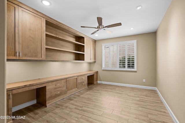 60922 E Arbor Basin Rd, Oracle, AZ 85623 - unfurnished office featuring built in desk, ceiling fan, baseboards, light wood finished floors, and recessed lighting