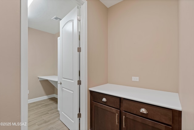 60922 E Arbor Basin Rd, Oracle, AZ 85623 - bathroom with wood finished floors and baseboards
