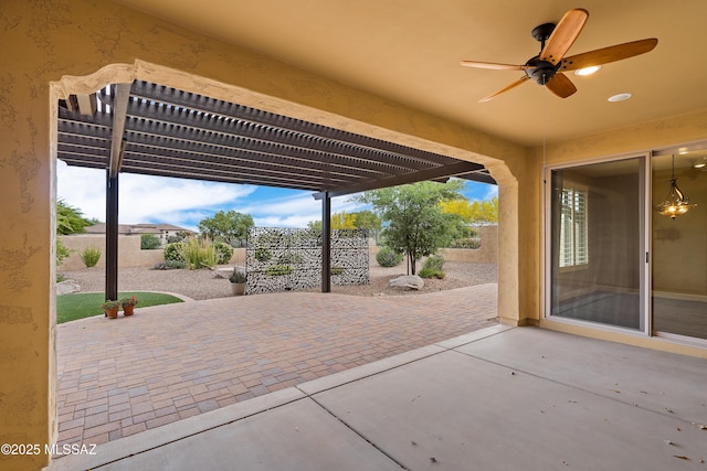 60922 E Arbor Basin Rd, Oracle, AZ 85623 - fenced backyard with a ceiling fan, a pergola, and a patio