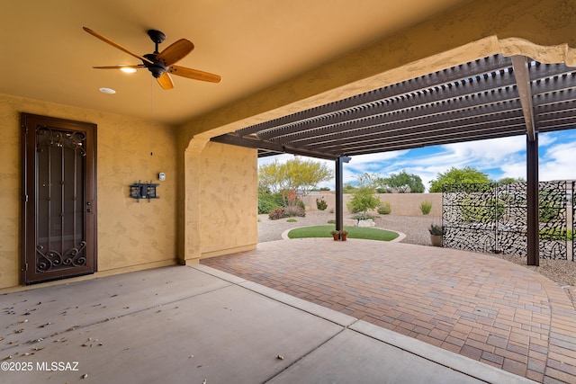 60922 E Arbor Basin Rd, Oracle, AZ 85623 - fenced backyard with ceiling fan, a patio, and a pergola