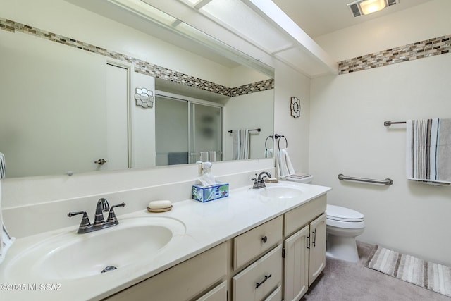 723 S Los Zafiros, Green Valley, AZ 85614 - full bath with double vanity, toilet, and a stall shower