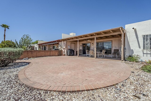 723 S Los Zafiros, Green Valley, AZ 85614 - rear view of house with a chimney and a patio area