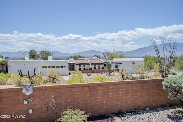 723 S Los Zafiros, Green Valley, AZ 85614 - view of yard with a mountain view and fence
