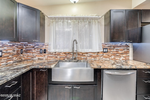 2 S Antietam Pl, Tucson, AZ 85710 - kitchen with a sink, stainless steel dishwasher, backsplash, and dark brown cabinets