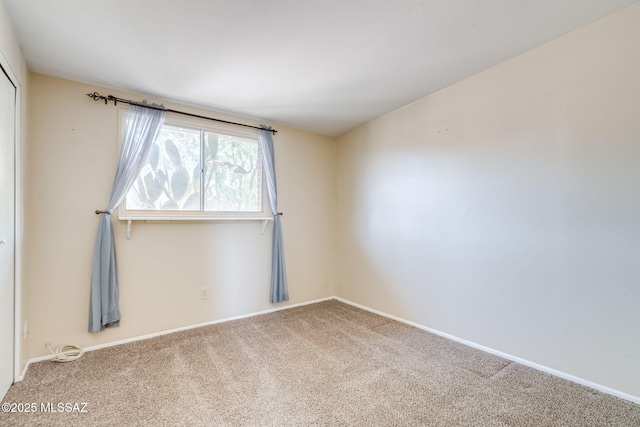 2 S Antietam Pl, Tucson, AZ 85710 - carpeted spare room featuring baseboards