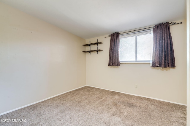 2 S Antietam Pl, Tucson, AZ 85710 - carpeted empty room featuring baseboards