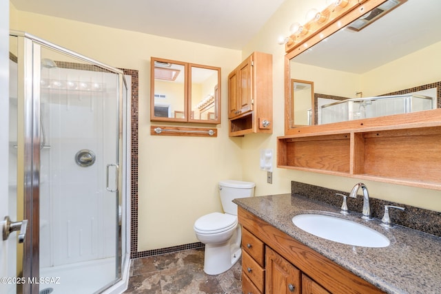 2 S Antietam Pl, Tucson, AZ 85710 - full bathroom with a stall shower, vanity, toilet, and stone finish flooring
