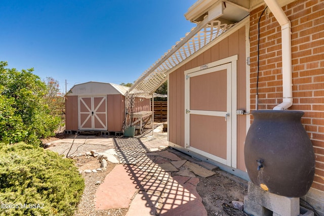 2 S Antietam Pl, Tucson, AZ 85710 - property entrance with brick siding and a patio