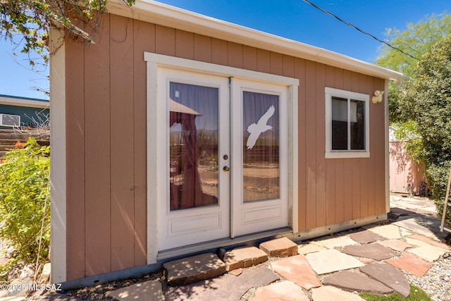 2 S Antietam Pl, Tucson, AZ 85710 - view of exterior entry featuring french doors
