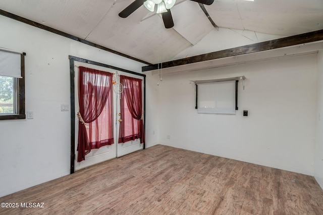 2 S Antietam Pl, Tucson, AZ 85710 - empty room with ceiling fan, wood finished floors, and lofted ceiling