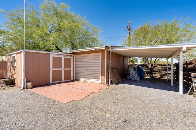 2 S Antietam Pl, Tucson, AZ 85710 - garage featuring a shed and a carport