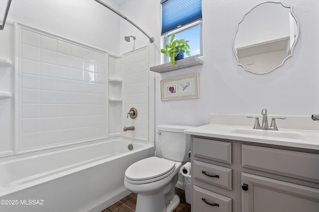 7138 W Ferntree Ln, Tucson, AZ 85757 - full bath featuring wood finished floors, toilet, tub / shower combination, and vanity