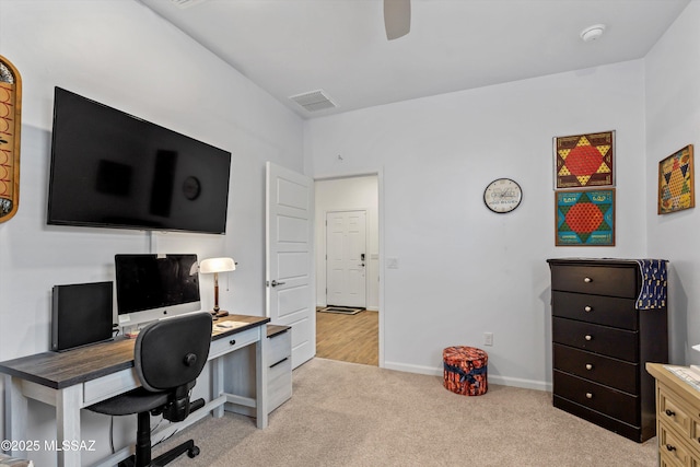 7138 W Ferntree Ln, Tucson, AZ 85757 - home office featuring light carpet, ceiling fan, and baseboards