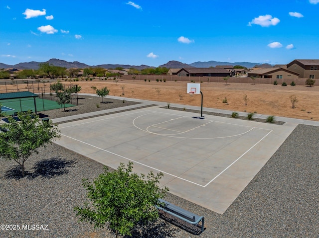 7138 W Ferntree Ln, Tucson, AZ 85757 - view of basketball court featuring community basketball court, a mountain view, and fence