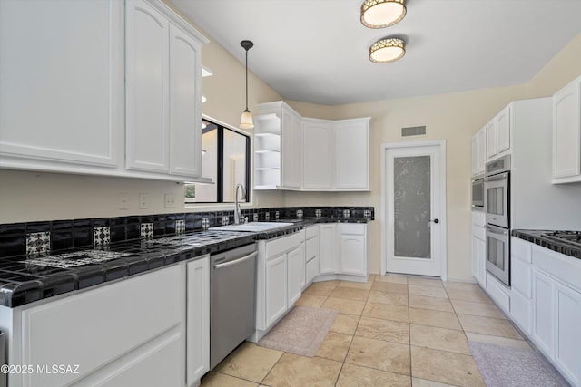 11300 N Scioto Ave, Oro Valley, AZ 85737 - kitchen featuring stainless steel appliances, a sink, white cabinets, and open shelves