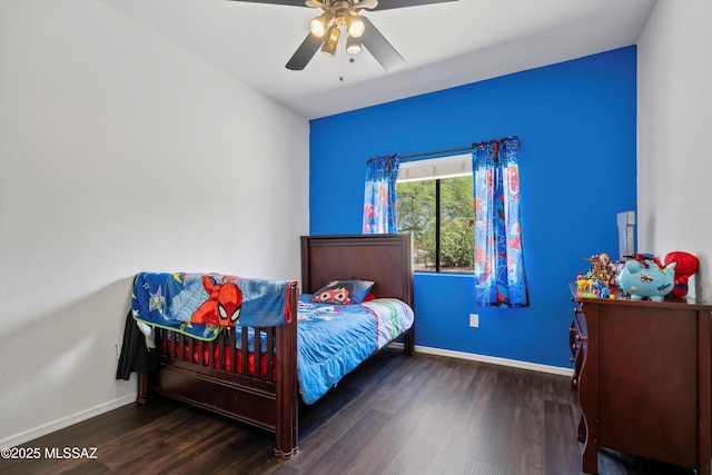 11300 N Scioto Ave, Oro Valley, AZ 85737 - bedroom with wood finished floors, baseboards, and ceiling fan