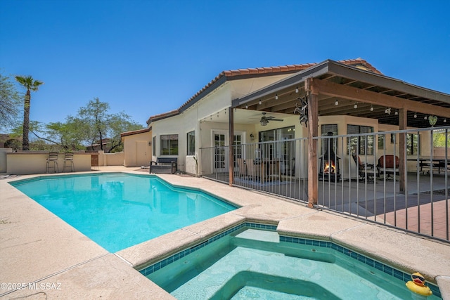 11300 N Scioto Ave, Oro Valley, AZ 85737 - view of swimming pool featuring an in-ground hot tub, a patio, and a ceiling fan