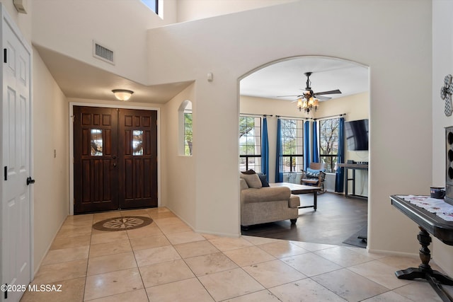 11300 N Scioto Ave, Oro Valley, AZ 85737 - entryway featuring arched walkways, light tile patterned floors, and a ceiling fan