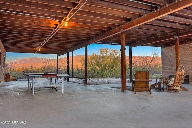 view of patio with a mountain view
