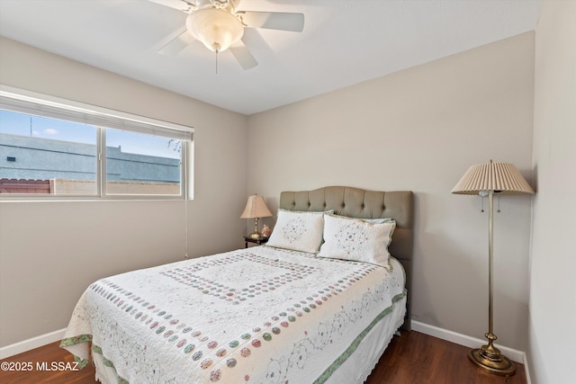 7624 E Helen St, Tucson, AZ 85715 - bedroom with baseboards, wood finished floors, and a ceiling fan