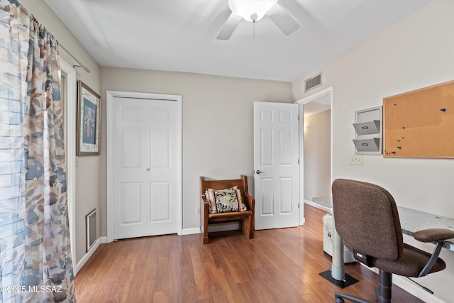 7624 E Helen St, Tucson, AZ 85715 - home office with wood finished floors and ceiling fan