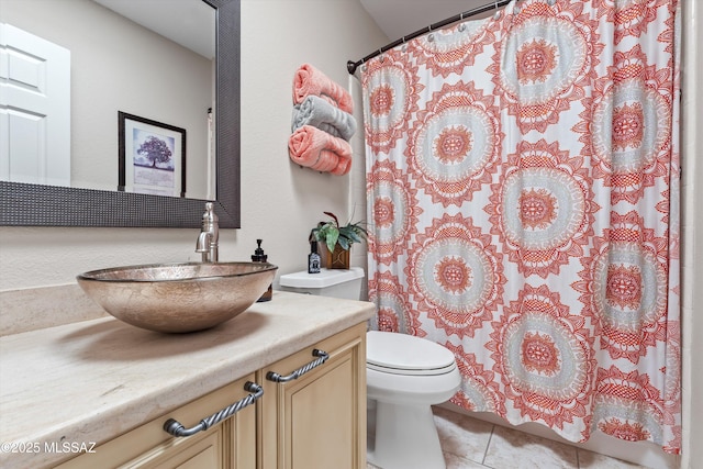 7624 E Helen St, Tucson, AZ 85715 - full bathroom with toilet, tile patterned floors, vanity, and a shower with curtain