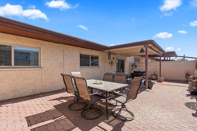 7624 E Helen St, Tucson, AZ 85715 - view of patio / terrace with outdoor dining area and fence