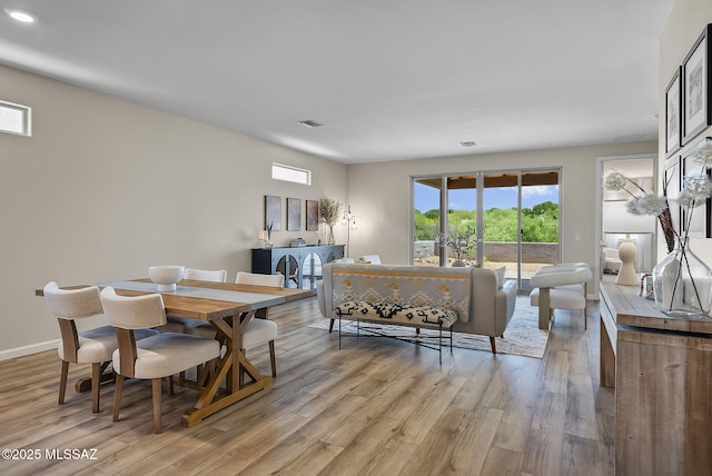 2125 Embarcadero Way, Tubac, AZ 85646 - dining area featuring light wood-type flooring, recessed lighting, and baseboards