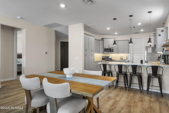 2125 Embarcadero Way, Tubac, AZ 85646 - dining room featuring recessed lighting, light wood-style flooring, and baseboards
