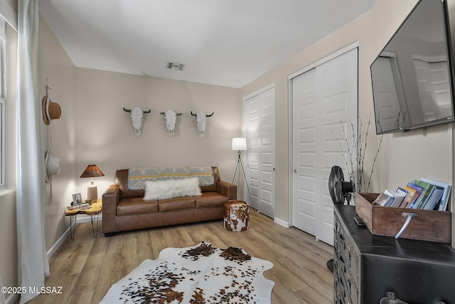 2125 Embarcadero Way, Tubac, AZ 85646 - living area with light wood-type flooring and baseboards