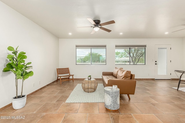 5050 N Crestridge Dr, Tucson, AZ 85718 - living area with a ceiling fan, baseboards, and recessed lighting