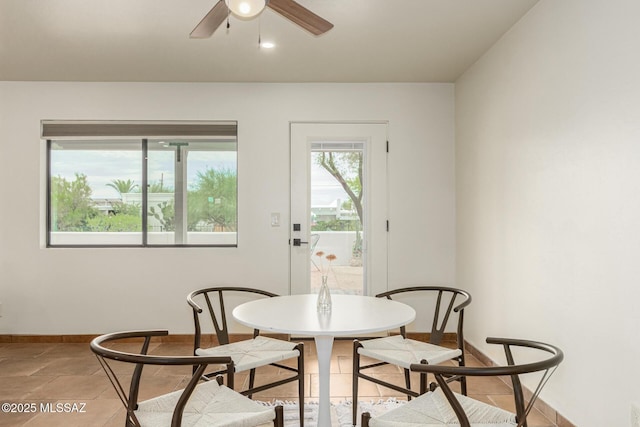 5050 N Crestridge Dr, Tucson, AZ 85718 - dining space featuring ceiling fan and baseboards