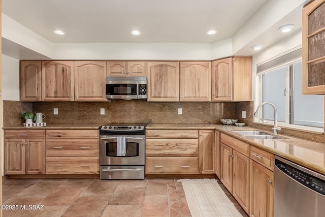 5050 N Crestridge Dr, Tucson, AZ 85718 - kitchen with appliances with stainless steel finishes, a sink, light brown cabinetry, tasteful backsplash, and recessed lighting