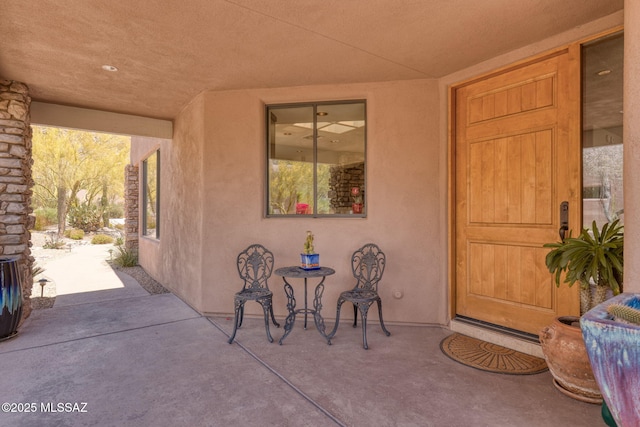 14198 N Gallery Pl, Marana, AZ 85658 - doorway to property with stucco siding and a patio area