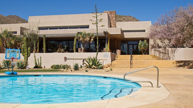 14198 N Gallery Pl, Marana, AZ 85658 - community pool featuring stairs and a patio