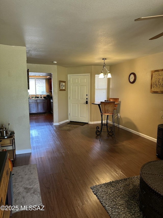 7255 E Snyder Rd # 7203, Tucson, AZ 85750 - entryway featuring wood finished floors, a ceiling fan, and baseboards