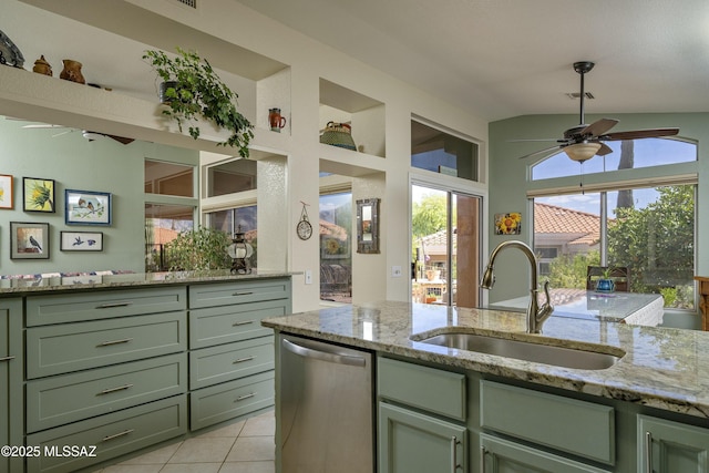 2246 E Amaranth St, Oro Valley, AZ 85755 - kitchen featuring a ceiling fan, green cabinetry, stainless steel dishwasher, a sink, and lofted ceiling